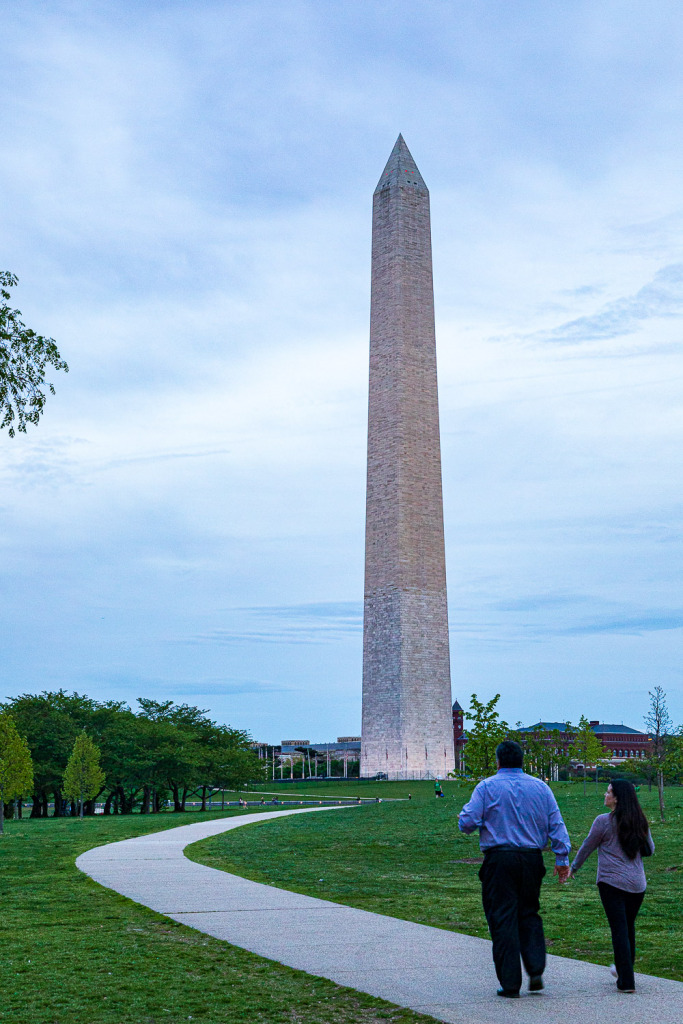 Couple Stolling Toward Washington Monument at Dusk