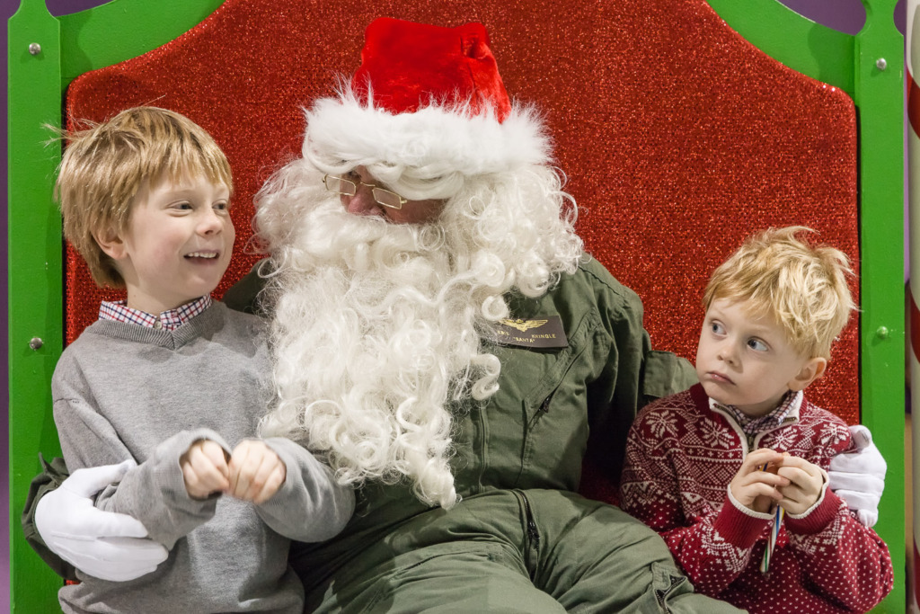 holiday photos of your family will included photos of your children meeting Santa in a flight suit