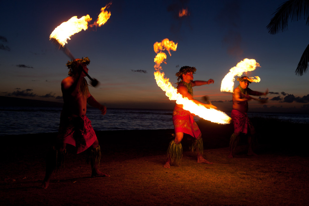 photo of firedancers in Hawaii at sunset