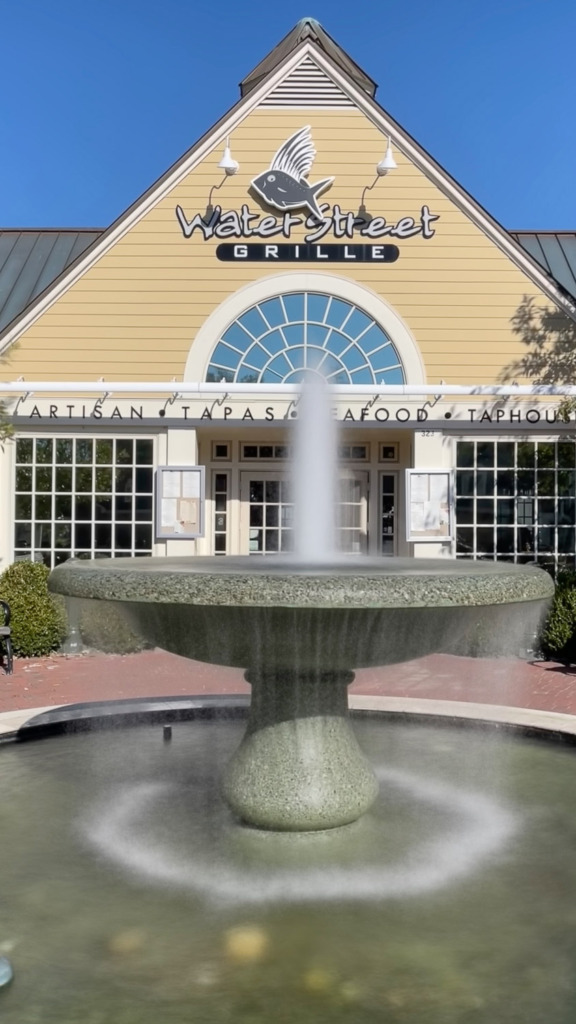 Live photo shot of fountain in front of Water Street Grille in Yorktown, VA. It has been set to long exposure.