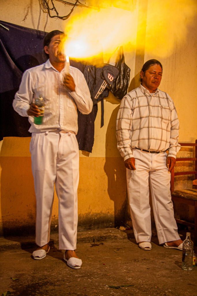 Two shamen performing a ceremony in Ecuador.