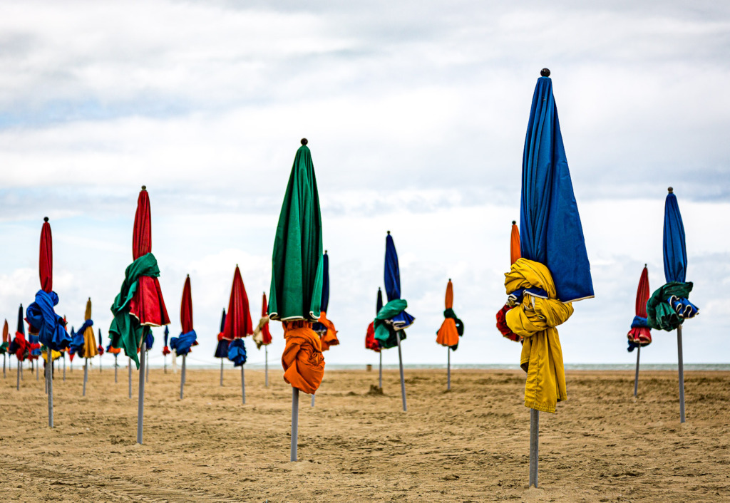 beach photo of Umbrellas at beach in Deauville, France