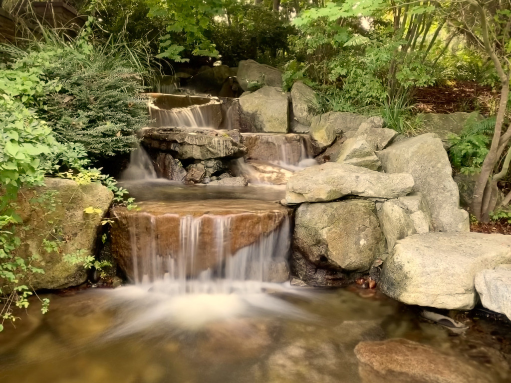 live photo of Waterfall at Cedarbrook Lodge in SeaTac, Washington, turned into a long exposure.