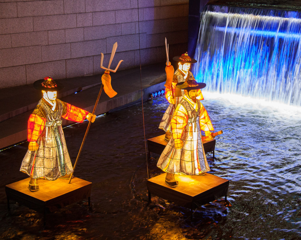 Three lanterns in Cheonggye Stream in Seoul, next to the waterfall.