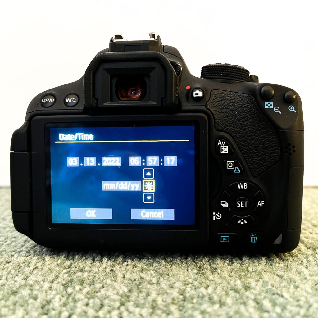 photo of Canon Camera with the time change options chosen in the meny