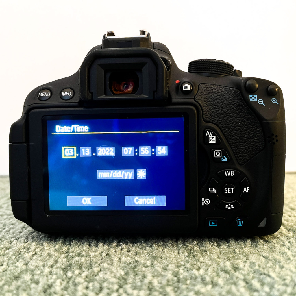 photo of Canon Camera with the time change options chosen in the meny